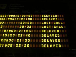 airport sign with delays